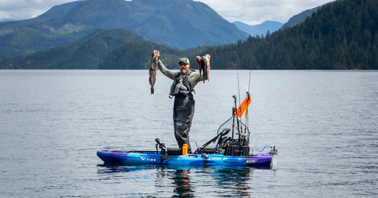 Man fishing from Vibe Makana 100 kayak thanks to Bixpy Canada motor attached