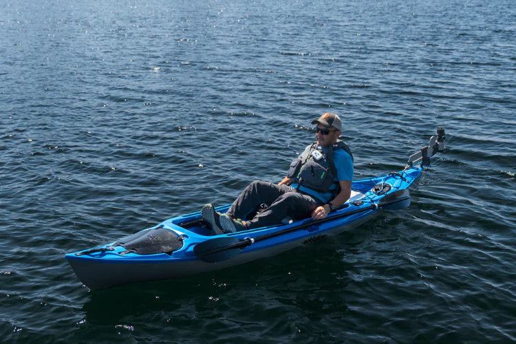 Man sits in Eddyline powered by Bixpy Canada motor