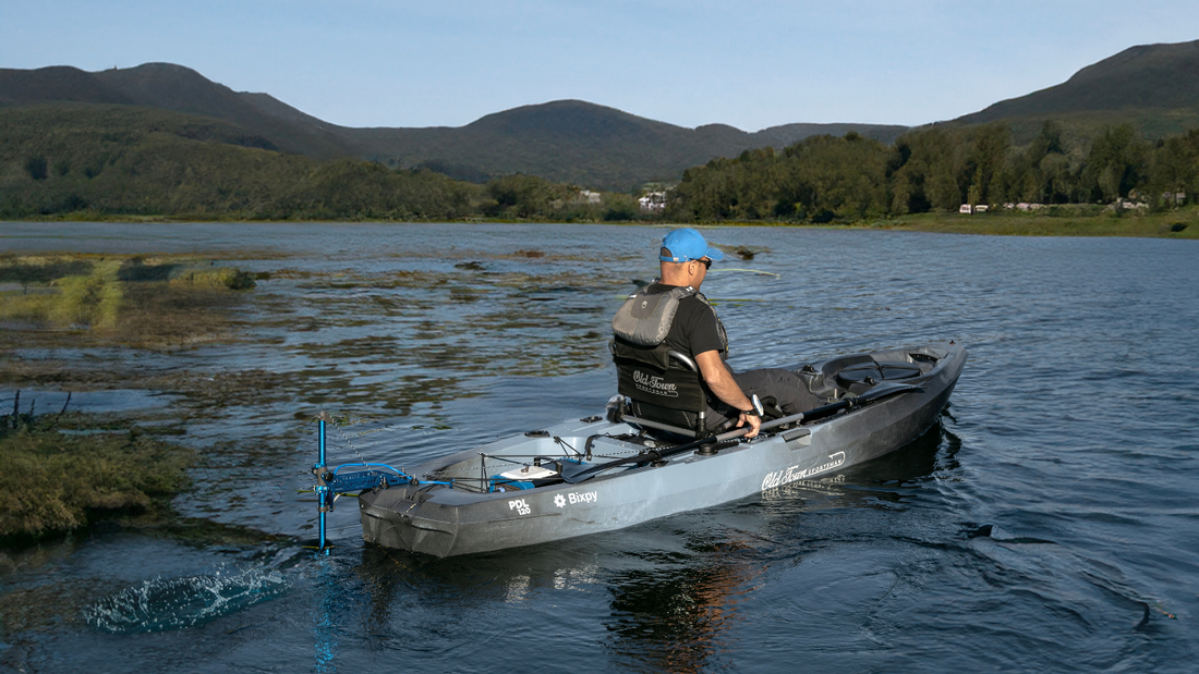 Man motors on lake with Bixpy Canada motor