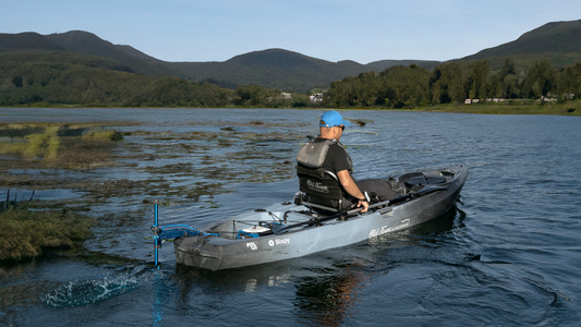 Man motors on lake with Bixpy Canada motor