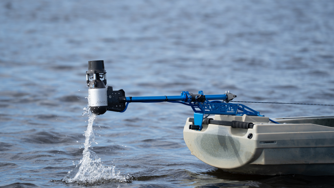 bixpy k-1 motor on a kayak lifted out of the water