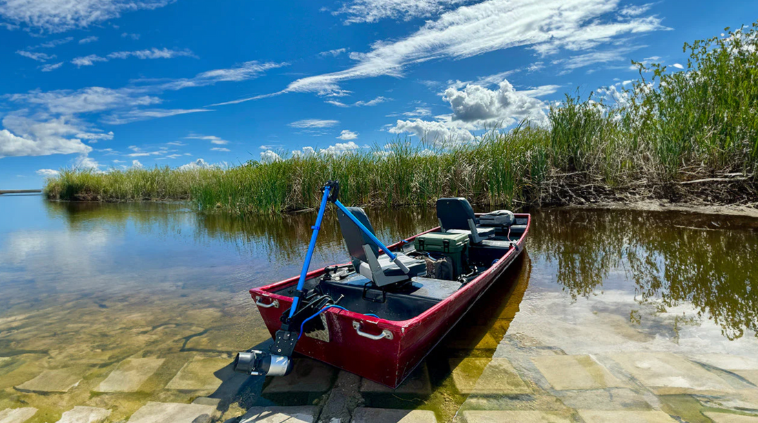 Canoe featuring a Bixpy K1 outboard electric motor