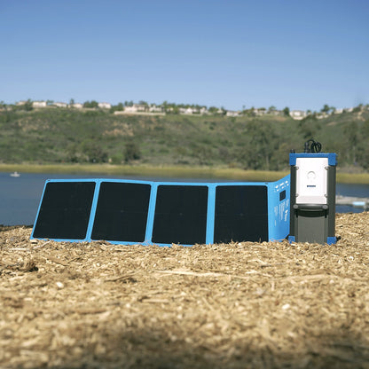 Solar-powered bixpy pp-768 battery on a beach with a scenic background