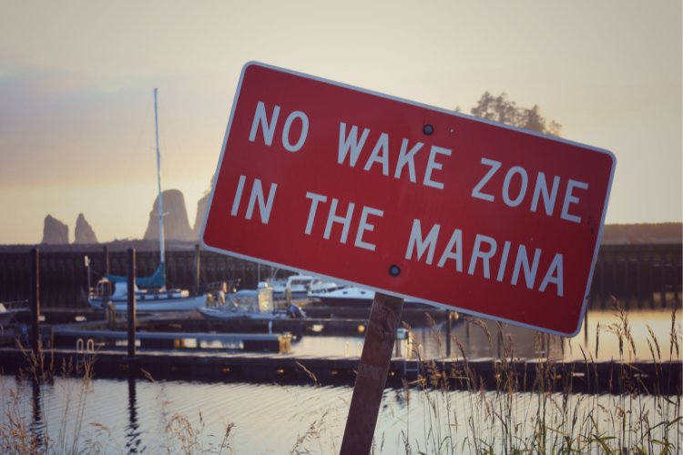 Red no wake zone in the marina sign