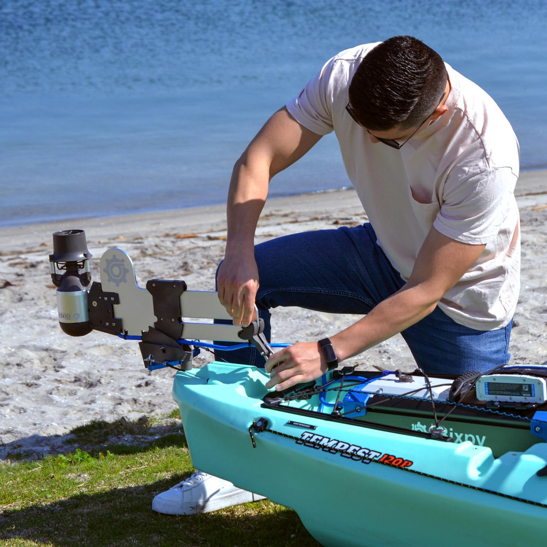 Man attaching K-1 Motor to watercraft using Versa Rudder Adapter